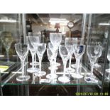 Twelve twist stem wine glasses including Stuart Crystal.