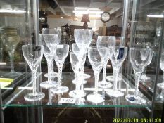 Twelve twist stem wine glasses including Stuart Crystal.