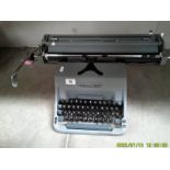 An Imperial typewriter with long carriage.