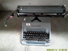 An Imperial typewriter with long carriage.