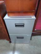 A metal 2 drawer cabinet