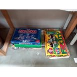 A selection of vintage Aussie Rules board games including Monopoly, all unchecked.