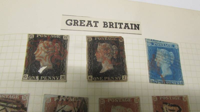 An album of Victorian to Elizabeth II stamps.