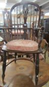 A Windsor chair with crinoline stretcher. COLLECT ONLY.
