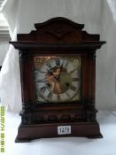 An eight day mantel clock.