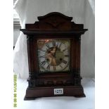 An eight day mantel clock.