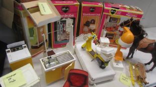 Four boxed Sindy items - shower (iwo), wardrobe, magic cooker (iwo) and other Sindy items