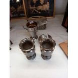 A selection of silverplate including vases