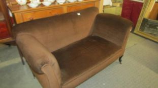 An Edwardian Chesterfield style sofa.