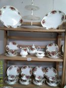 A Royal Albert Old Country Roses tea set - Teapot, milk jug, sugar basin, cake stand, 2 sandwich