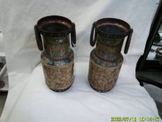 A pair of Huntley & Palmer Egyptian vases (no lids).