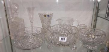 A selection of glass bowls, decanters and Dartington Crystal champagne flutes etc.