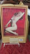 A 1954 calendar depicting Marylin Monroe in nude post.