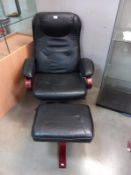 A black leather swivel chair & stool