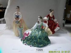 Three Royal Doulton figurines - Alexandra Hn3286, Stephanie HN2811 and Elyse HN2474.