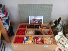 A storage box of vintage Lego bricks & parts