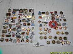 Approximately 100 assorted Russian badges.