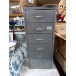 A grey metal 6 drawer filing cabinet. 66cm x 28cm x 41cm