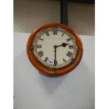 A chain driven circular wall clock. complete and working. COLLECT ONLY.