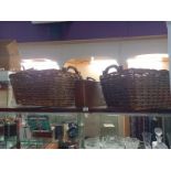 2 large wicker baskets with grab handles & a small suitcase