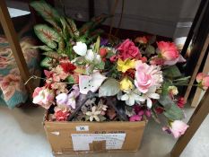 A box of realistic flowers