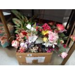 A box of realistic flowers