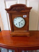 An old Edwardian oak mantle clock