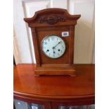 An old Edwardian oak mantle clock