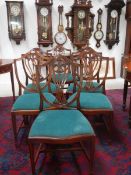 A set of six shield back Sheraton style dining chairs, COLLECT ONLY.