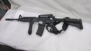 A Skirmishable UK Legal tactical M4 carbine extendable stock, full auto/single fire.