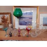 A good selection of cut glass including coloured glass