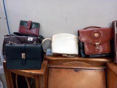 A quantity of handbags