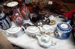 A quantity of mid 20th century teapots