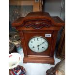 An early 20th century old tall mantle clock, in working order