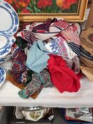 A quantity of old silk scarves etc.