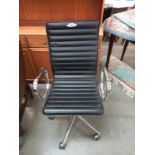 A retro style chrome & leather swivel chair