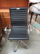 A retro style chrome & leather swivel chair