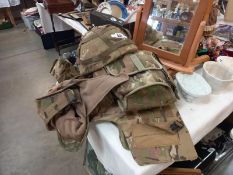 A quantity of old Army uniform items