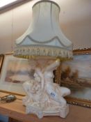 A good mid 20th century plaster table lamp including shade