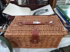 A 20th century wicker picnic basket with 2 glasses etc.