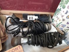 3 old microphones