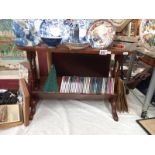 A side table with book stand below