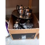 A box containing stainless steel items etc.