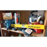 A shelf of workshop items