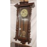 A Victorian mahogany wall clock. COLLECT ONLY.