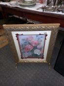 A decoupage fire screen. COLLECT ONLY.