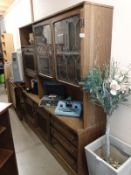 An oak cabinet with leaded glass