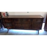 An oak 4 over 4 sideboard