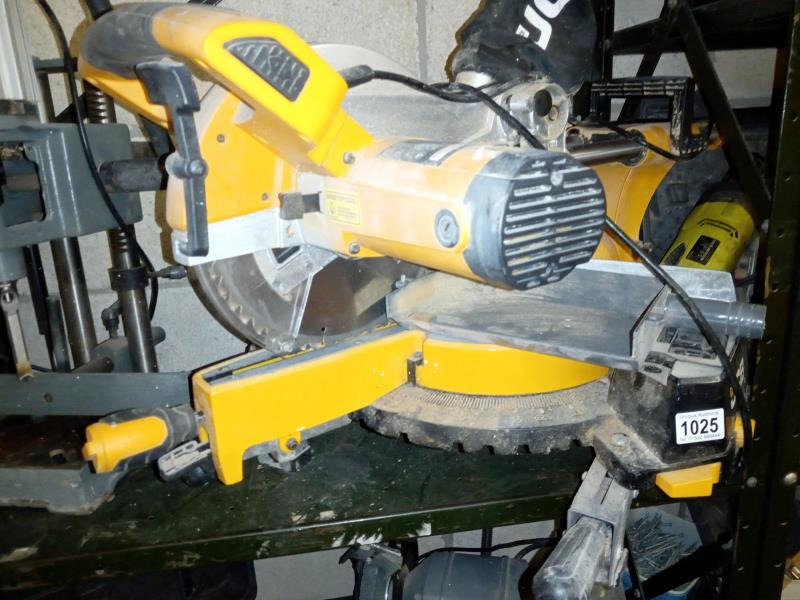 A JCB compound mitre saw