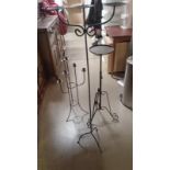 2 metal large candlesticks and 1 other